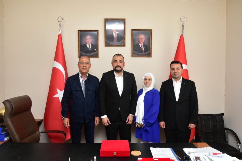 AK PARTİLİLERDEN MHP İLÇE BAŞKANI ERTUĞRUL'A ZİYARET