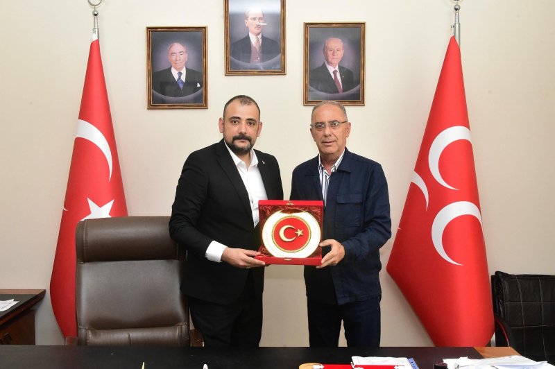 AK PARTİLİLERDEN MHP İLÇE BAŞKANI ERTUĞRUL'A ZİYARET