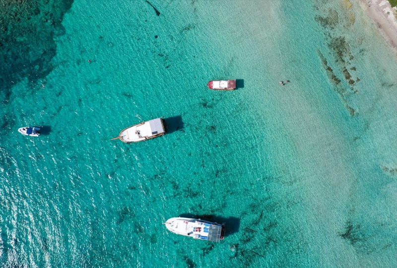 Türkiye'nin el değmemiş saklı güzelliği 'Dikili': Eşsiz koylar ve 40 km'lik kumsal