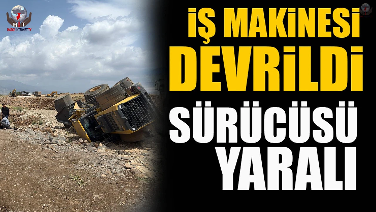Devrilen iş makinasının sürücüsü yaralandı