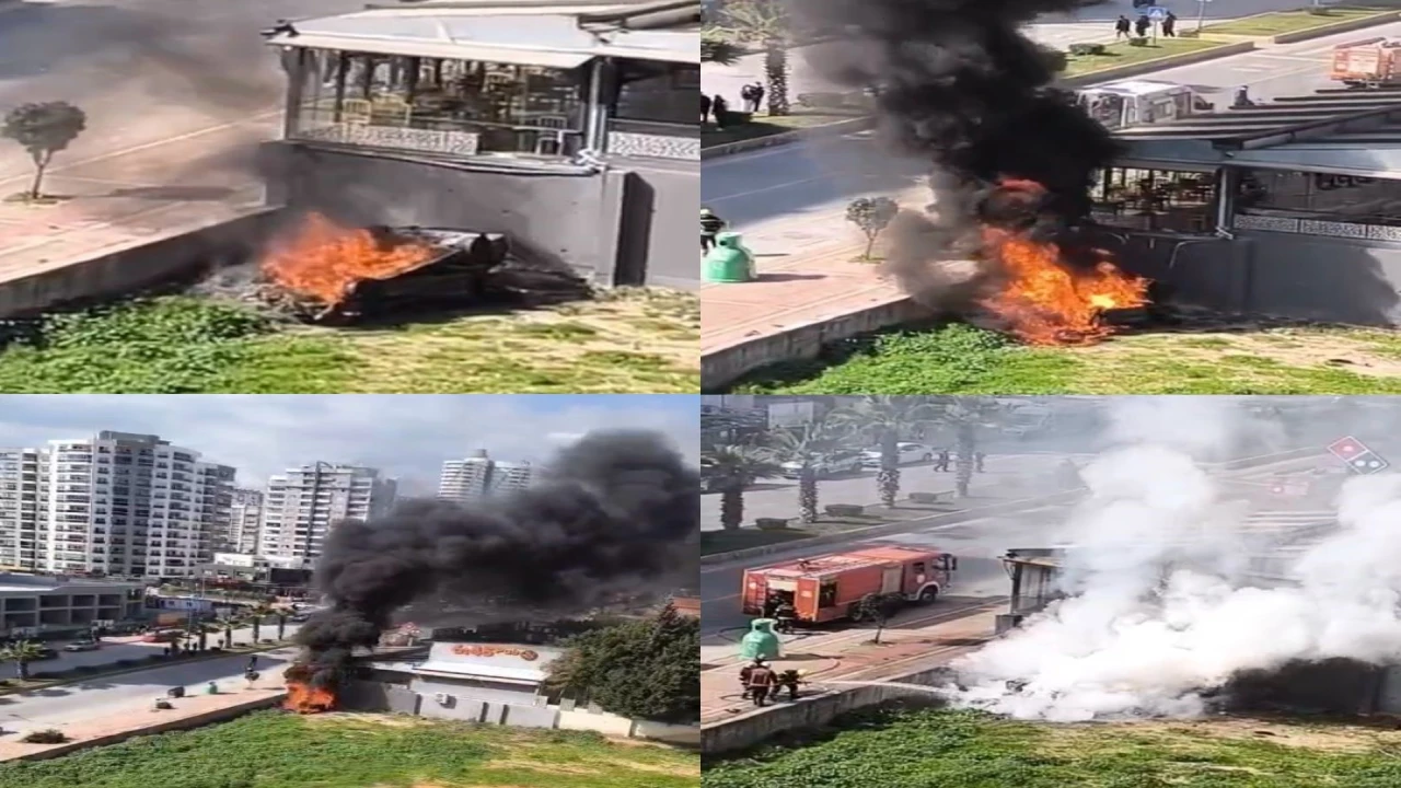 Mersinde iş yerinin duvarına çarpan otomobil alev aldı: 1 yaralı