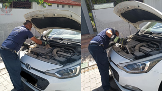 Araç motoruna sıkışan kediyi itfaiye kurtardı