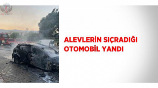  Alevlerin sıçradığı otomobil yandı