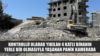 Kontrollü olarak yıkılan 4 katlı binanın yerle bir olmasıyla yaşanan panik kamerada