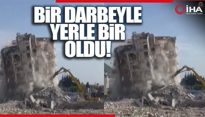 8 katlı bina iş makinesinin darbesiyle kağıt gibi yerle bir oldu