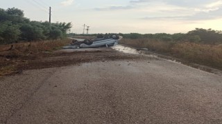 Kayganlaşan yolda takla atarak durabildi