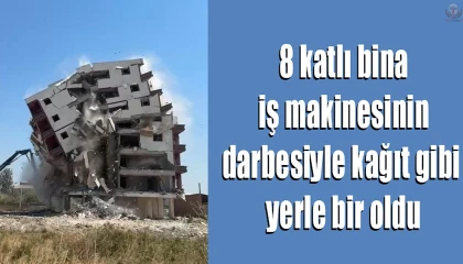 8 katlı bina iş makinesinin darbesiyle yerle bir oldu