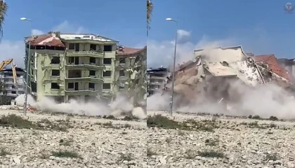 7 katlı bina iş makinesinin dokunuşuyla kağıt gibi yıkıldı