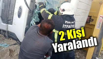 Devrilen hafriyat kamyonundaki 2 kişi yaralandı