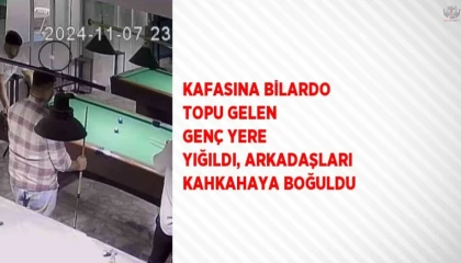 Kafasına bilardo topu gelen genç yere yığıldı, arkadaşları kahkahaya boğuldu