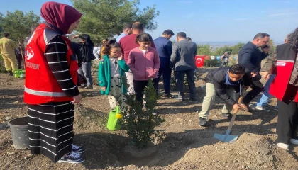 Osmaniyede bin fidan toprakla buluşturuldu
