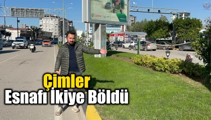 Üzerine basıldığında uyarı veren çimleri test etmek isteyenler esnafı ikiye böldü