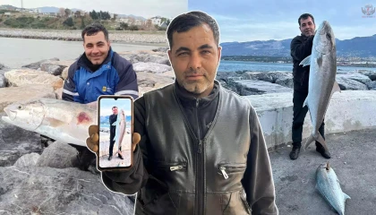 Amatör balıkçı bir metrelik iki dev balığı oltayla tek seferde yakaladı