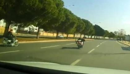 Hem ehliyetsiz hem de motosikleti yatarak sürünce ceza yağdı