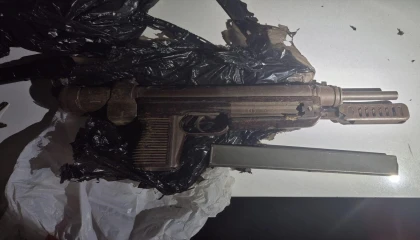 Kovalamaca sonucu yakalanan şüpheliden otomatik tabanca çıktı