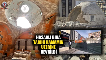 Hasarlı bina yıkım esnasında tarihi hamamın üzerine devrildi