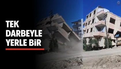 4 katlı bina iş makinesinin darbesiyle yerle bir oldu