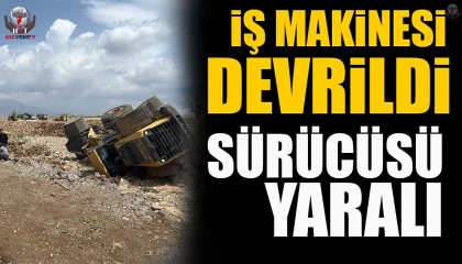 Devrilen iş makinasının sürücüsü yaralandı