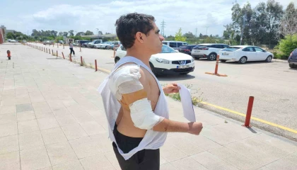 Hastaneye giderken kurt köpeğinin saldırısıyla yaralandı