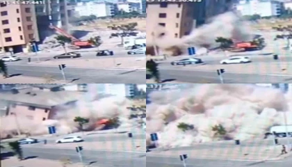 Binanın iş makinesinin üzerine çöktüğü anlar kamerada