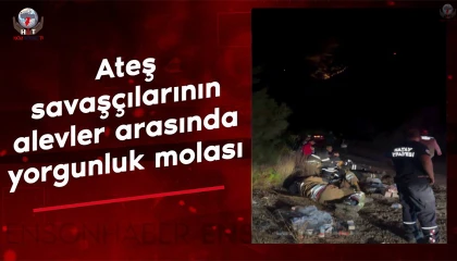 Ateş savaşçılarının alevler arasında yorgunluk molası