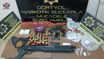Dörtyol'da evden uyuşturucu ve cephanelik çıktı