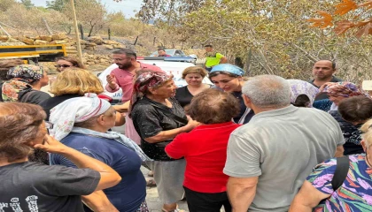 Ersin, yangında evleri zarar görenlerle bir araya geldi