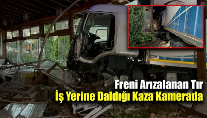 Freni arızalanan tırın önüne kattığı araçla iş yerine daldığı kaza kamerada