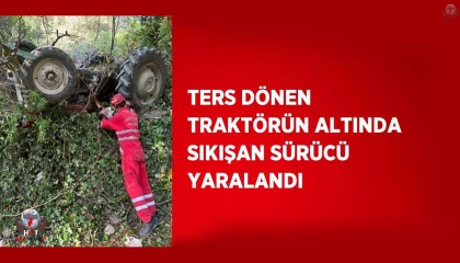 Ters dönen traktörün altında sıkışan sürücü yaralandı