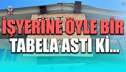 İş yerine astığı tabelayla yüzleri gülümseten esnaf, görenlerin ilgisini çekiyor