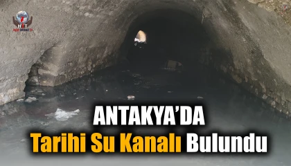 Depremde yıkılan binanın arazisinde yaşanan göçükle tarihi su kanalı ortaya çıktı