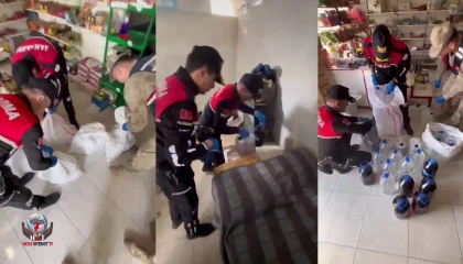 Markette satışa hazır litrelerce kaçak alkol ele geçirildi