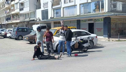 Bisikletli çocuğa çarpmamak için motosikletini devirip yaralandı