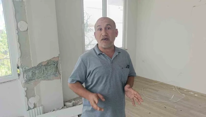 Çatlaklardan ışık görülen apartmanda korku dolu yaşam