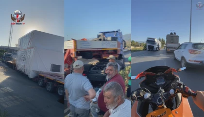 Hatayda devrilen tır yolu trafiğe kapattı, uzun araç kuyruğu oluştu