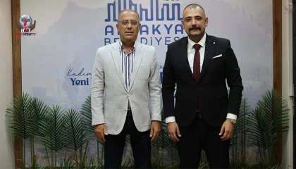 MHP İLÇE BAŞKANI ERTUĞRUL'DAN BAŞKAN YAPAR'A ZİYARET