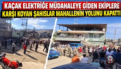 Kaçak elektriğe müdahaleye giden ekiplere karşı koyan şahıslar mahallenin yolunu kapattı