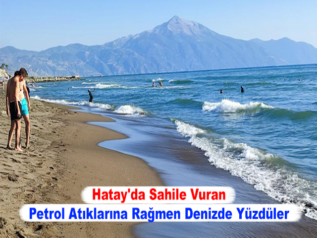 Hatay'da Sahile Vuran Petrol Atıklarına Rağmen Denizde Yüzdüler