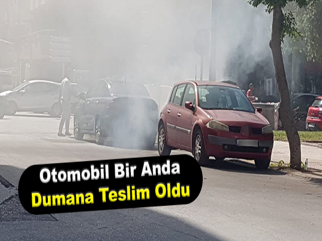 Hatay’da park halindeki otomobil bir anda dumana teslim oldu